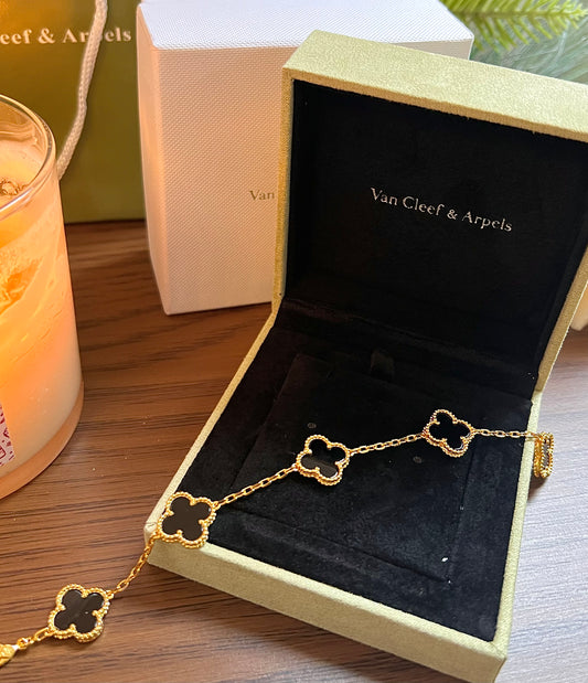 Brazalete Trébol Black & Gold de Van Cleef